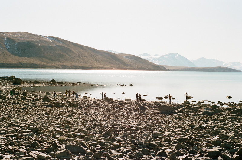 Shoreline with tourists at Lake Tekapo