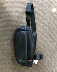 Tomtoc EDC 4L travel sling displayed.